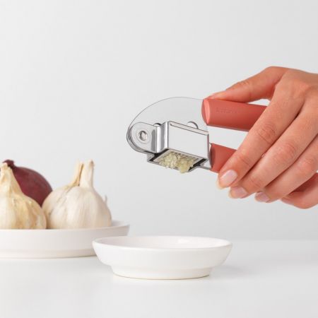 Brabantia Tasty Garlic Press Teracotta Pink - KITCHEN HAND TOOLS - Beattys of Loughrea