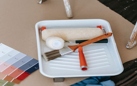 Paint Roller And Brush On Plastic Tray