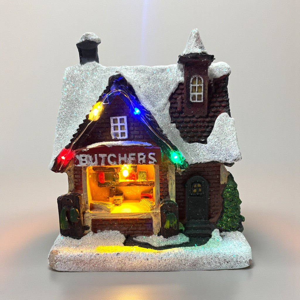 Noma Collectables 12cm Battery Operated Village Scene – Village Butchers - XMAS ROOM DECORATION LARGE AND LIGHT UP - Beattys of Loughrea
