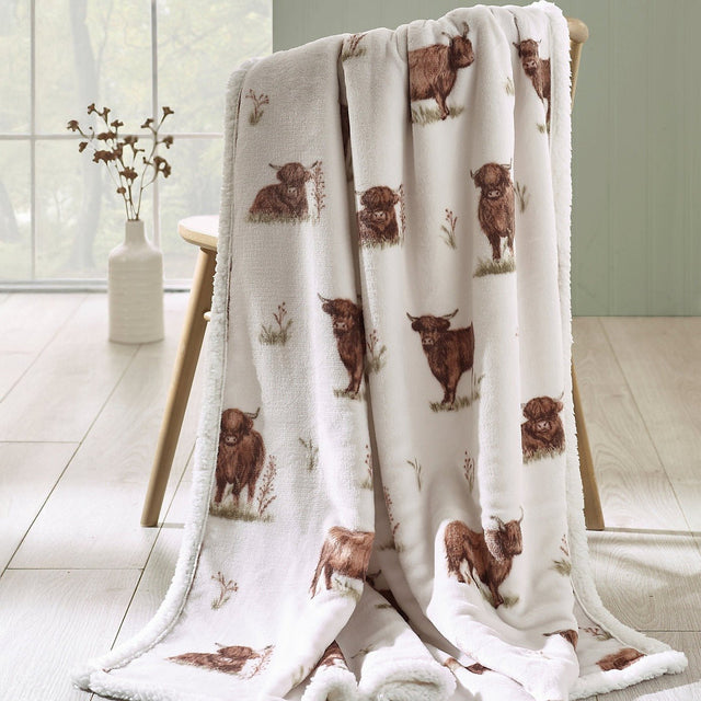 Catherine Lansfield Angus Highland Cow Cosy Fleece Blanket Throw – Natural (130x170cm) - THROWS/BLANKETS - Beattys of Loughrea