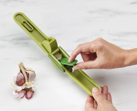 Joseph Joseph CleanForce™ Green Garlic Press - KITCHEN HAND TOOLS - Beattys of Loughrea