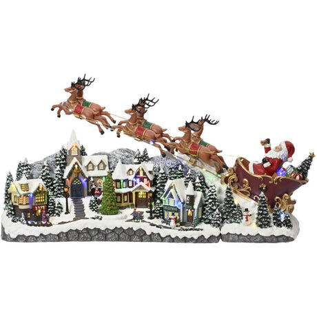 Led Lit Animated Musical Christmas Village Scene Wih Santa And Reindeer - XMAS ROOM DECORATION LARGE AND LIGHT UP - Beattys of Loughrea