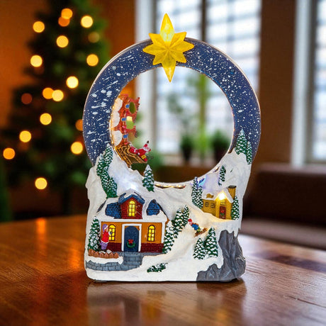 29cm BO Lit Village with Looping Santa Sleigh - XMAS CERAMIC WOOD RESIN GLASS ORNAMENTS - Beattys of Loughrea