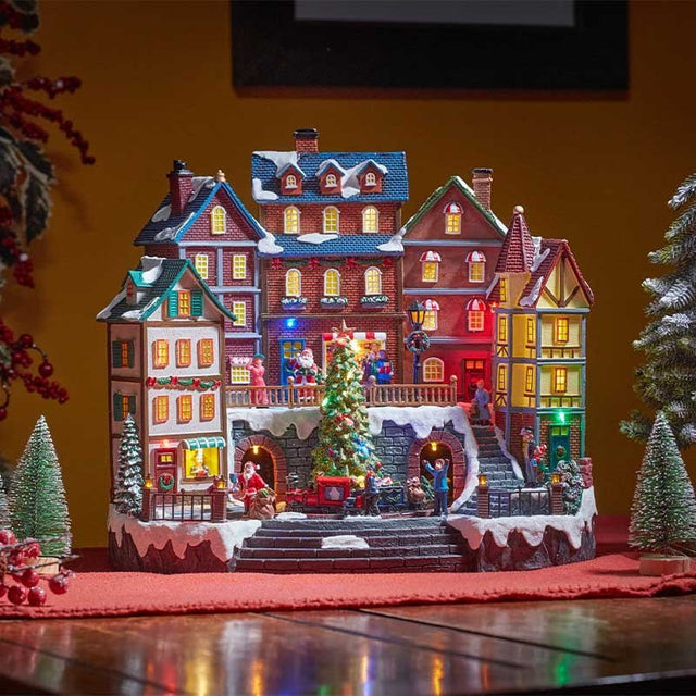 Santa's Town Large Animated Musical LED Snow Scene – 37cm x 41cm - XMAS CERAMIC WOOD RESIN GLASS ORNAMENTS - Beattys of Loughrea