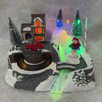 Noma Snowman & Train Village Scene – 17cm