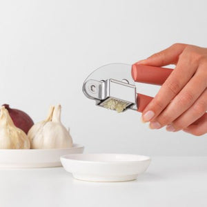 Brabantia Tasty Garlic Press Teracotta Pink - KITCHEN HAND TOOLS - Beattys of Loughrea